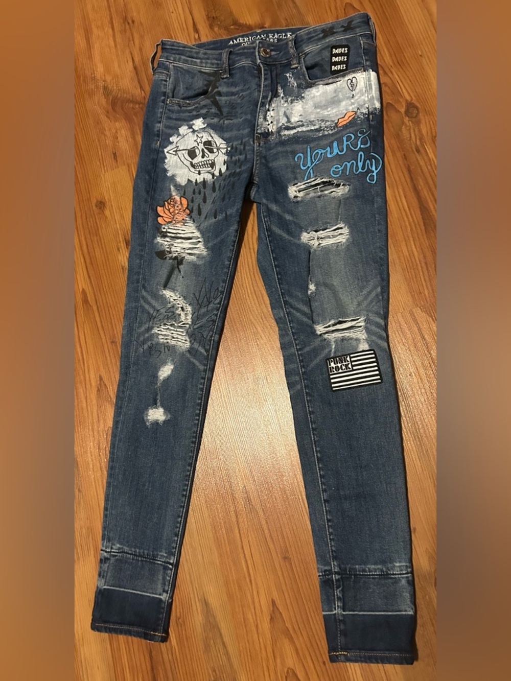 American Eagle Outfitters Blue Distressed Skinny Jeans with Graphic Patches